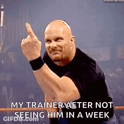 A Bald Wrestler Is Giving The Middle Finger While Saying " My Trainer After Not Seeing Him In A Week " GIF