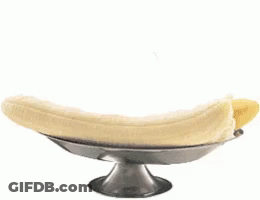 A Banana Split With Three Different Flavors Of Ice Cream And Whipped Cream GIF