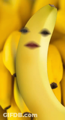 A Banana With A Face On It Surrounded By Other Bananas GIF