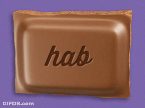 A Bar Of Chocolate Has The Word Hab Written On It GIF