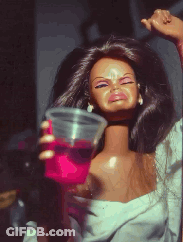 A Barbie Doll Is Holding A Plastic Cup Of Pink Liquid GIF