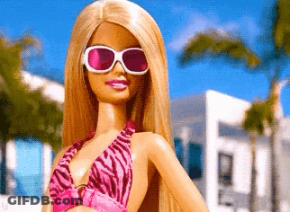 A Barbie Doll Is Wearing Sunglasses And A Bikini GIF