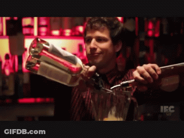 A Bartender Is Pouring A Drink Into A Blender With A Label That Says Ibc GIF
