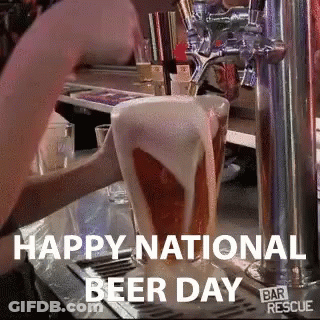 A Bartender Pouring Beer Into A Glass That Says Happy National Beer Day On It GIF