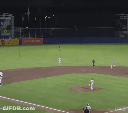 A Baseball Field With An Amerant Bank Sign In The Background GIF