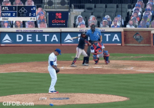 A Baseball Game Being Played In Front Of A Delta Ad GIF