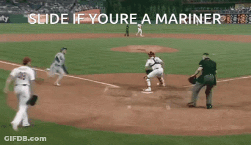 A Baseball Game Being Played With The Words Slide If Youre A Mariner GIF