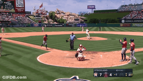 A Baseball Game Between The Angels And The Astros Is Being Played GIF