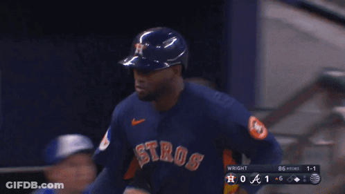 A Baseball Game Between The Astros And The Braves GIF
