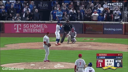 A Baseball Game Between The Phillies And The Mets Is Being Played GIF