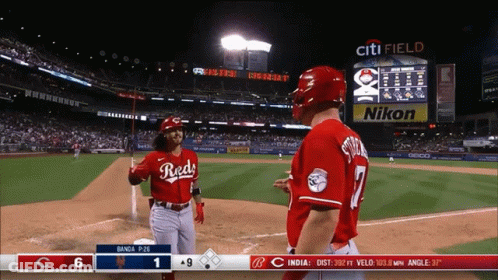 A Baseball Game Between The Reds And The Yankees Is Being Played At Citi Field GIF