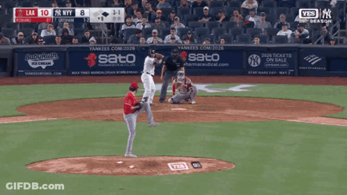 A Baseball Game Between The Yankees And The Dodgers Is Being Played GIF