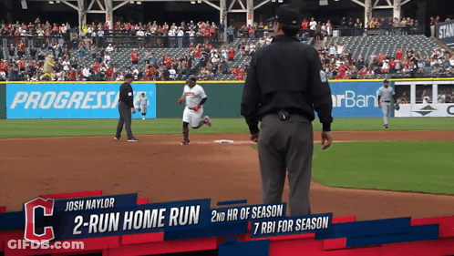 A Baseball Game Is Being Played And A Player Named Josh Naylor Is Running To First Base GIF