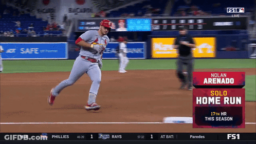 A Baseball Game Is Being Played And Nolan Arenado Is On The Field GIF