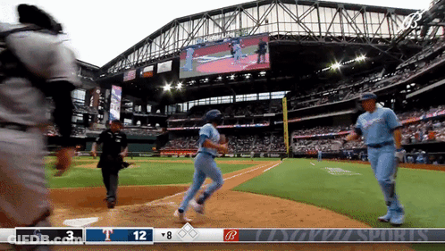 A Baseball Game Is Being Played And The Score Is 3 To 8 GIF