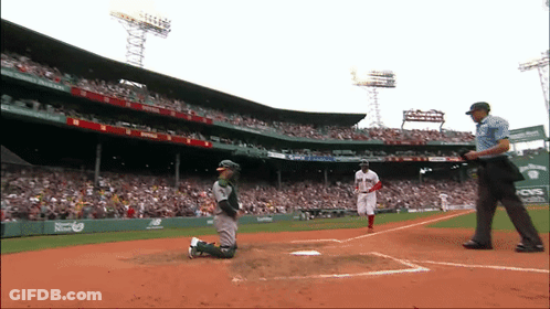 A Baseball Game Is Being Played At A Stadium That Has A Cvs Ad On The Wall GIF