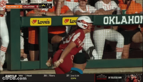 A Baseball Game Is Being Played Between Oklahoma St And College Softball GIF