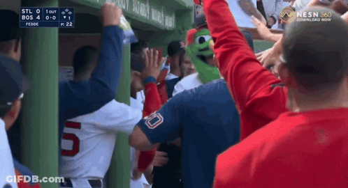 A Baseball Game Is Being Played Between The Bos And The Reds GIF
