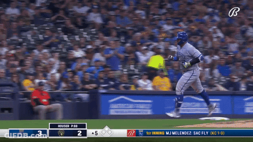 A Baseball Game Is Being Played Between The Brewers And The Royals GIF