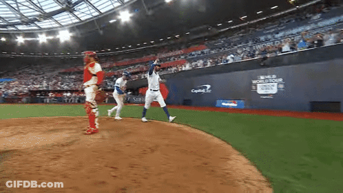 A Baseball Game Is Being Played In A Stadium With A Capital One Sign On The Wall GIF