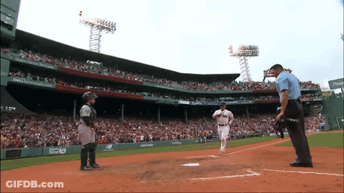 A Baseball Game Is Being Played In A Stadium With A Dell Ad On The Wall GIF