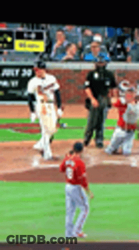 A Baseball Game Is Being Played In A Stadium With A Sign That Says Just 30 On It GIF