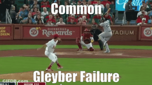 A Baseball Game Is Being Played In A Stadium With An Ad For Rewards In The Outfield GIF