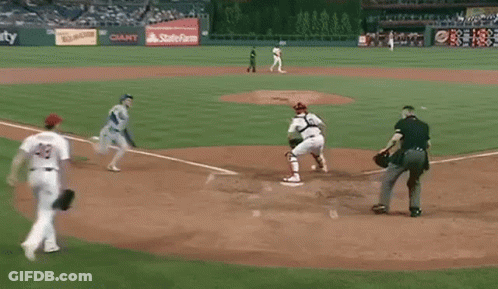 A Baseball Game Is Being Played In A Stadium With An Ad For State Farm GIF