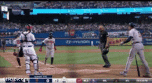 A Baseball Game Is Being Played In A Stadium With Hyundai Advertisements On The Wall GIF