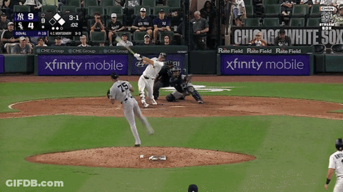 A Baseball Game Is Being Played In A Stadium With Xfinity Mobile Advertisements GIF