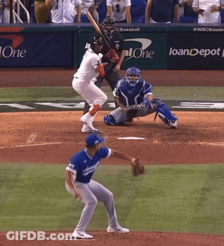 A Baseball Game Is Being Played In Front Of A Banner That Says Loandepot GIF