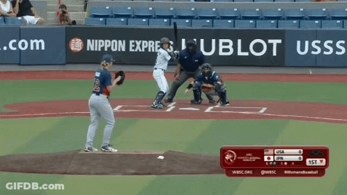 A Baseball Game Is Being Played In Front Of A Banner That Says Nippon Express GIF
