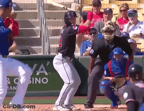 A Baseball Game Is Being Played In Front Of A Casino GIF