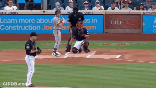 A Baseball Game Is Being Played In Front Of A Citi Field Sign GIF