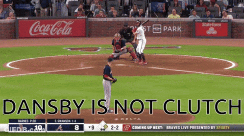 A Baseball Game Is Being Played In Front Of A Coca-Cola Ad GIF