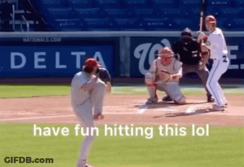 A Baseball Game Is Being Played In Front Of A Delta Sign . GIF