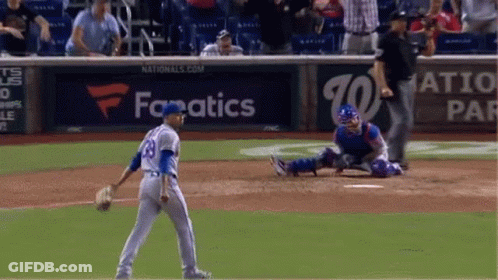 A Baseball Game Is Being Played In Front Of A Fanatics Sign GIF