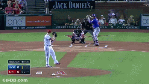 A Baseball Game Is Being Played In Front Of A Jack Daniels Sign GIF