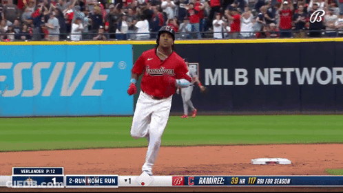 A Baseball Game Is Being Played In Front Of A Mlb Network Ad GIF
