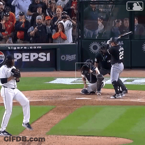 A Baseball Game Is Being Played In Front Of A Pepsi Banner GIF