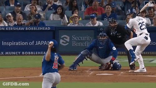 A Baseball Game Is Being Played In Front Of A Security Benefit Advertisement GIF