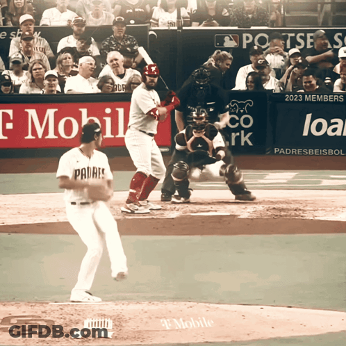 A Baseball Game Is Being Played In Front Of A T Mobile Sign GIF