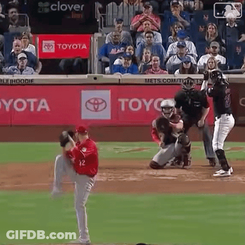 A Baseball Game Is Being Played In Front Of A Toyota Banner GIF