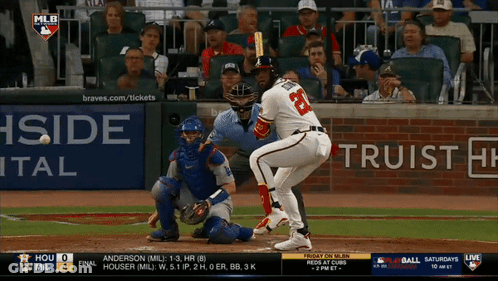 A Baseball Game Is Being Played In Front Of A Trust Bank Ad GIF