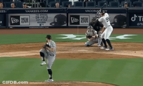 A Baseball Game Is Being Played In Front Of A Yankees Advertisement GIF