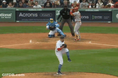 A Baseball Game Is Being Played In Front Of An Acronis Banner GIF