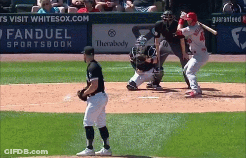 A Baseball Game Is Being Played In Front Of An Ad For Fanduel Sportsbook GIF