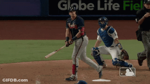 A Baseball Game Is Being Played In Front Of An Ad For Globe Life GIF
