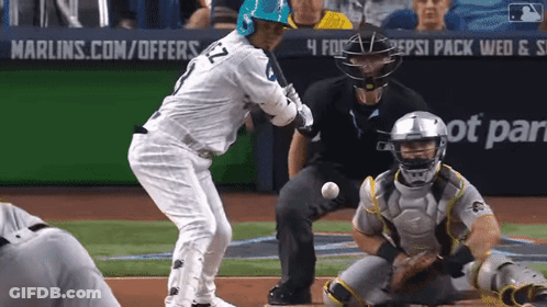 A Baseball Game Is Being Played In Front Of An Ad For Pepsi Pack GIF