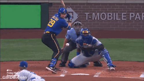 A Baseball Game Is Being Played In Front Of An Advertisement For T Mobile GIF